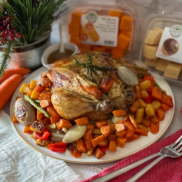 Stuffed Whole Chicken with Vegetable Sides