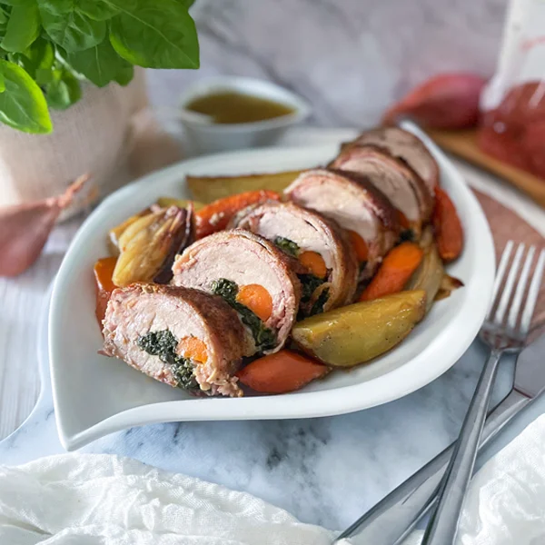Pork Tenderloin stuffed and served with vegetables