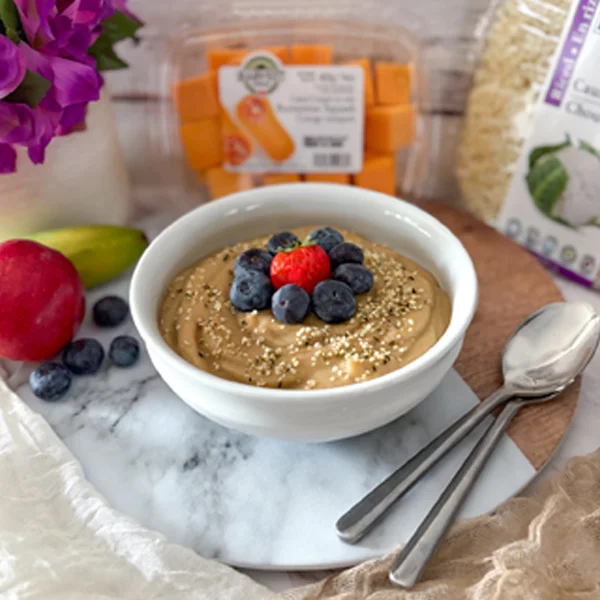 Power protein bowl with veggies and fruit and protein powder