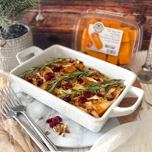 Side Dish with Roasted butternut squash and brie topped with rosemary and cranberries