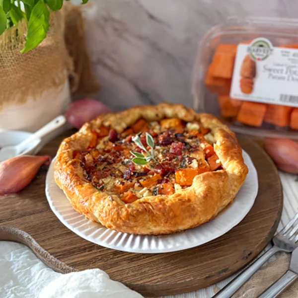 Puff Pastry with roasted sweet Potato, caramelized shallots and feta topped with bacon and hot honey